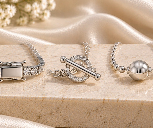 Five silver bracelet closure styles including lobster, box, toggle, magnetic and bolo slider for Jewelry Towns bracelet clasp guide