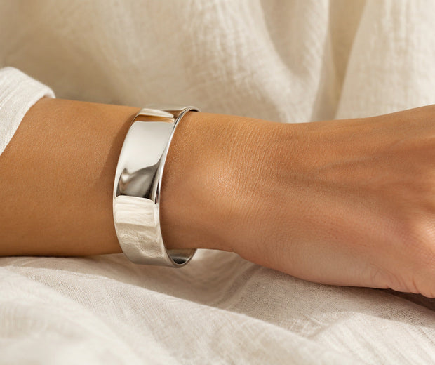 Polished sterling silver open cuff worn on the wrist for Jewelry Towns cuff bracelet guide