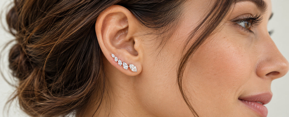 Graduated sterling silver ear climber following the curve of the lobe for Jewelry Towns guide