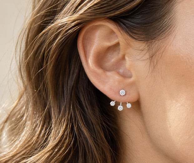 Sterling silver ear jacket with front stud and curved stones behind the lobe for Jewelry Towns guide