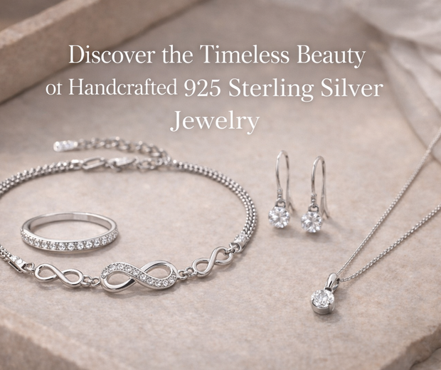 Handcrafted 925 sterling silver jewelry set arranged on a soft beige stone surface, featuring an infinity bracelet, a delicate ring, drop earrings, and a solitaire pendant necklace in an elegant editorial style.