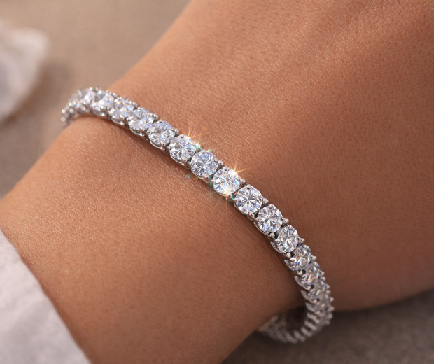925 sterling silver moissanite tennis bracelet close-up on wrist showing brilliance and sparkle natural lighting