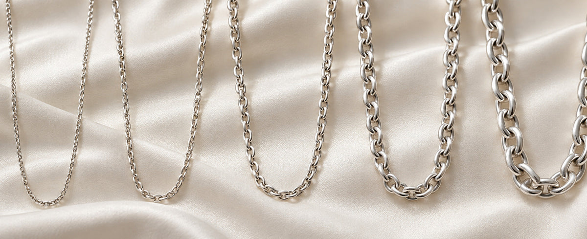 Five sterling silver necklace chains arranged from fine to bold for Jewelry Towns thickness guide
