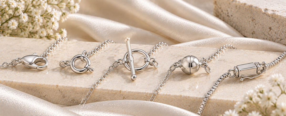 Five silver necklace clasp styles including lobster, spring ring, toggle, magnetic and box clasp for Jewelry Towns clasp guide