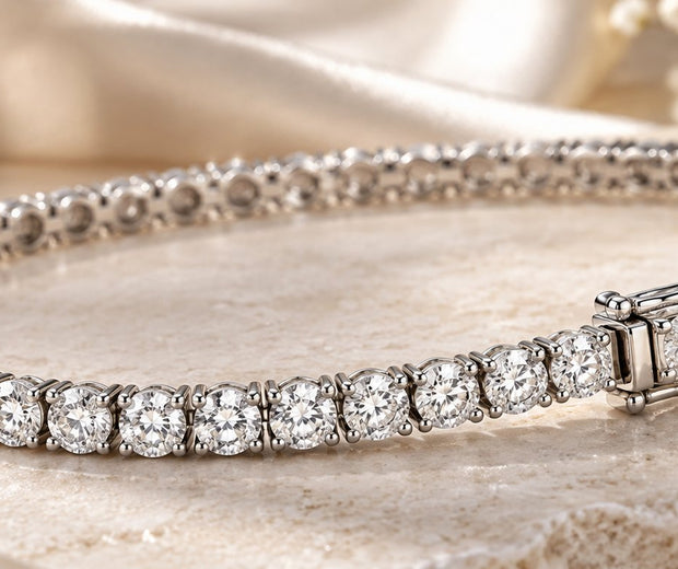 Tennis bracelet with round stones on marble for Jewelry Towns tennis bracelet guide