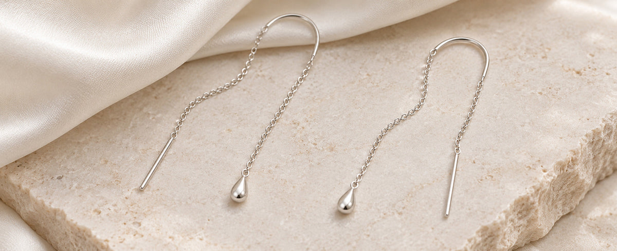 Fine sterling silver threader earrings showing chain bar and curved thread for Jewelry Towns guide