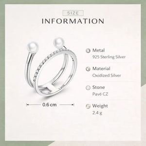 Close-up of simulated white shell pearls and pavé cubic zirconia row on oxidized silver double band – Jewelry Towns