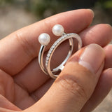 Adjustable thick sterling silver ring worn on index finger showing geometric parallel bands – Jewelry Towns
