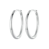 Huggie Hoop Earrings.