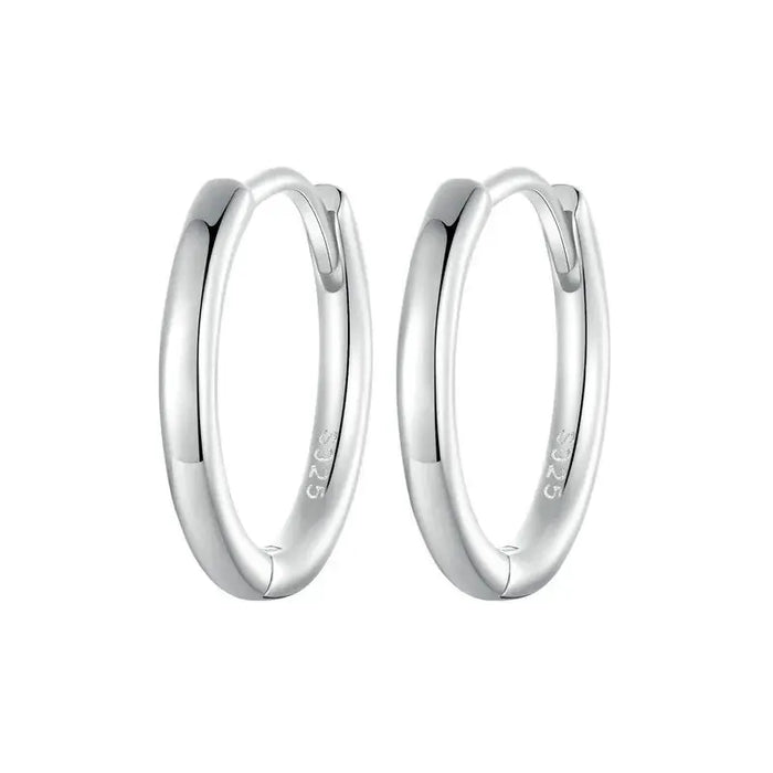 Huggie Hoop Earrings.
