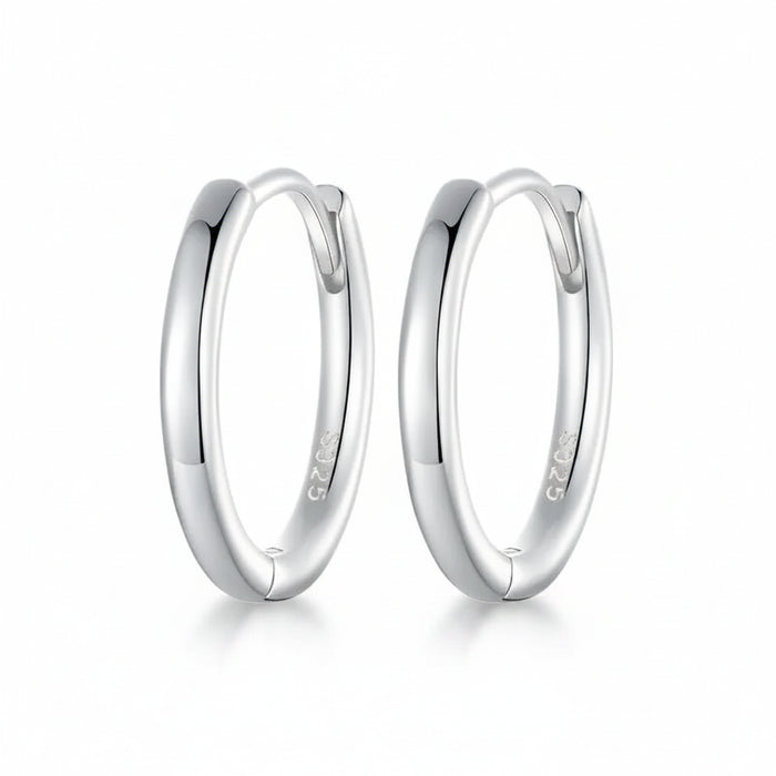 CZ huggie hoop earrings in 925 sterling silver