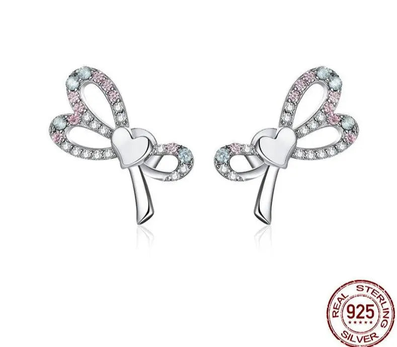Bow knot earrings in 925 sterling silver with pink and blue cubic zirconia