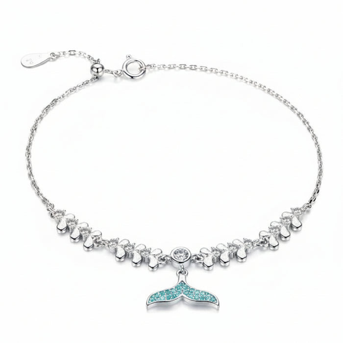 Ocean Whisper fish tail bracelet in 925 sterling silver with blue sparkle detail