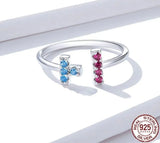 Vibrant Tetris-inspired ring worn as a playful, creative statement piece.